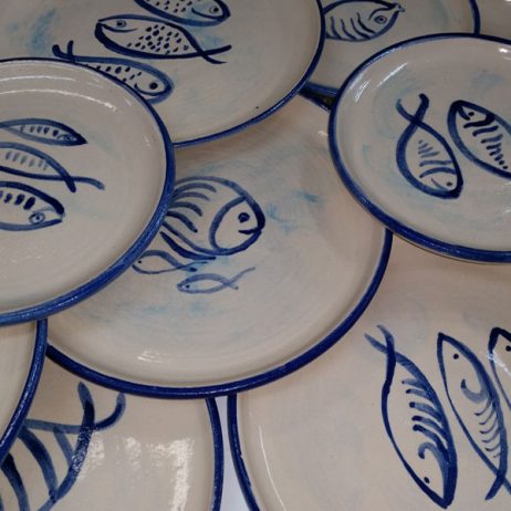 Fish paintings on ceramic plates
